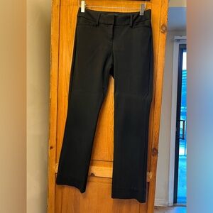 Black Express trousers, columnist cut, barely boot, low rise, size 00S or 00P.